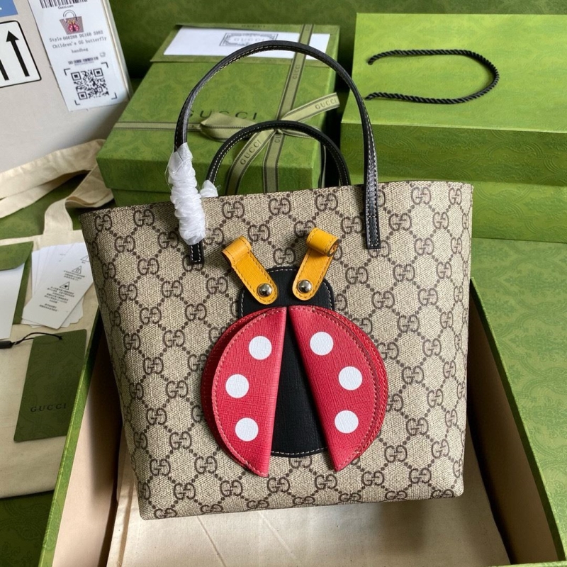 G*u*i shopping bags